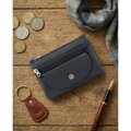 Granatowe etui na klucze ze skóry naturalnej z zewnętrzną kieszenią na zatrzask, zamykane suwakiem