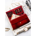 Czerwony portfel damski z lakierowanej skóry naturalnej zamykany zatrzaskiem - Peterson