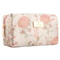 Różowa kosmetyczka z poliestru, jednokomorowa i ozdobiona kwiatowym wzorem - Peterson