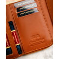 Brązowy portfel damski wykonany ze skóry ekologicznej i zamykany na zatrzask - Peterson