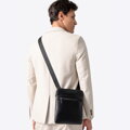 Malá crossbody taška z imitácie kože čierna Wittchen 100-4P-912-1